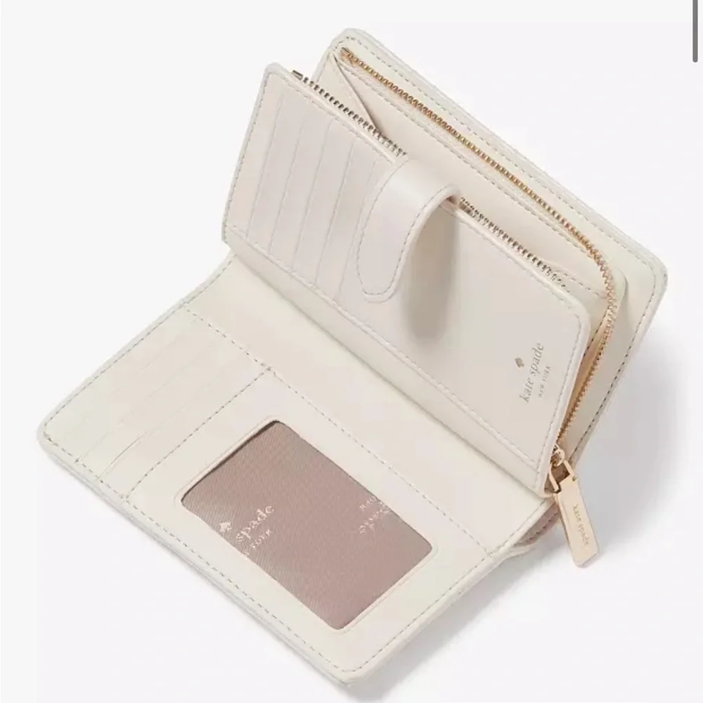 KATE SPADE Carey Medium Compact Bifold Wallet Parchment Color